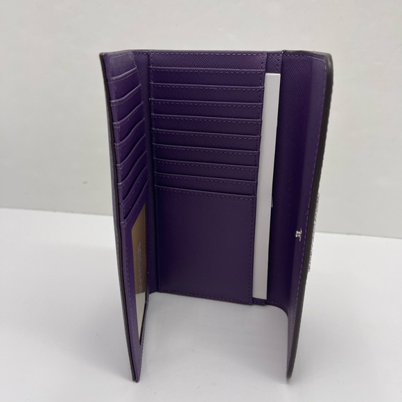 Michael Kors Lg Jet Set Travel Trifold Leather Wallet
Dark Purple
NWT - Picture 16 of 16